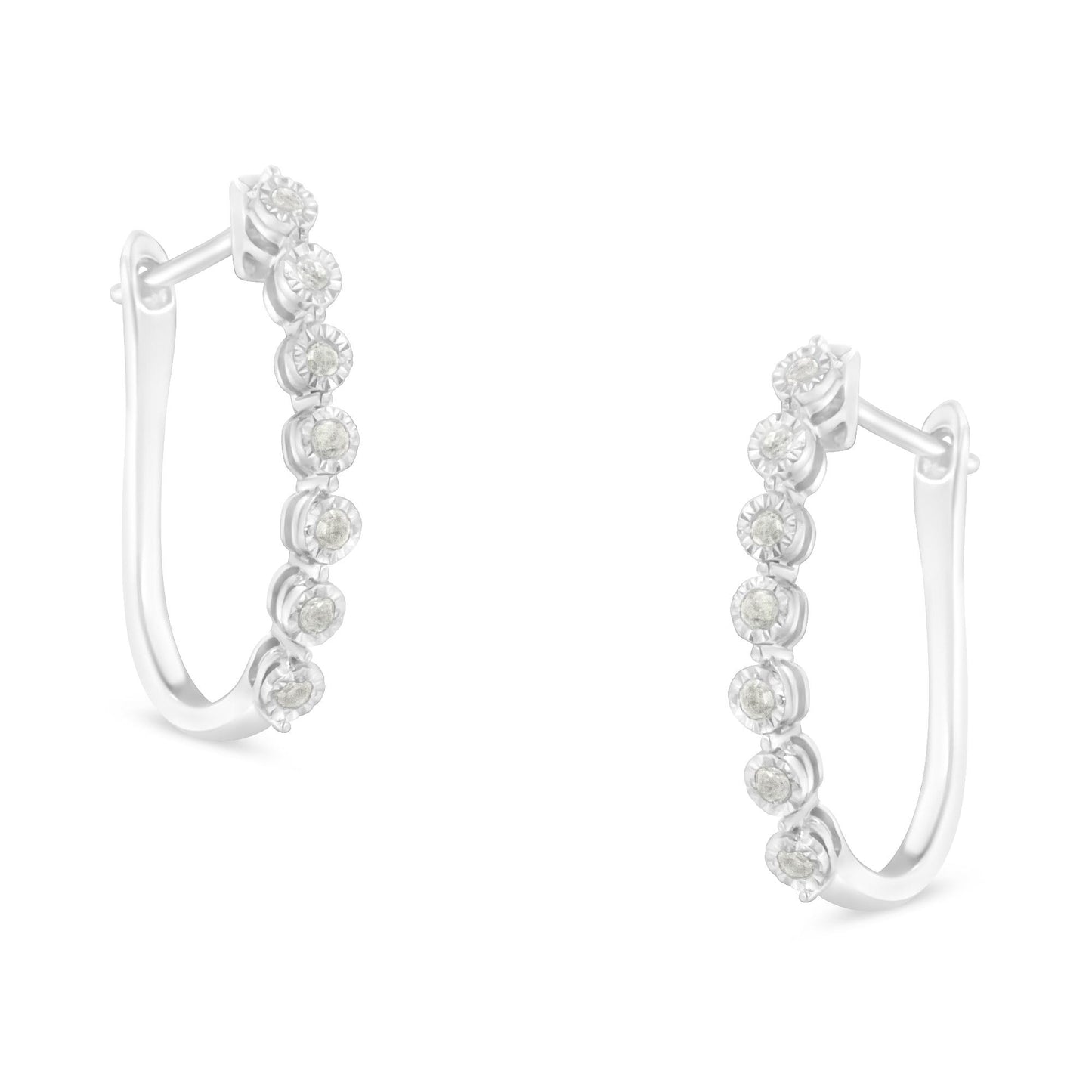 Pair of white metal hoop earrings with round white gemstones in miracle setting, shown from front angle.