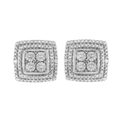Front view of a pair of white metal square earrings with four round white gemstones in the center and micro-pave white gemstones around the edges.