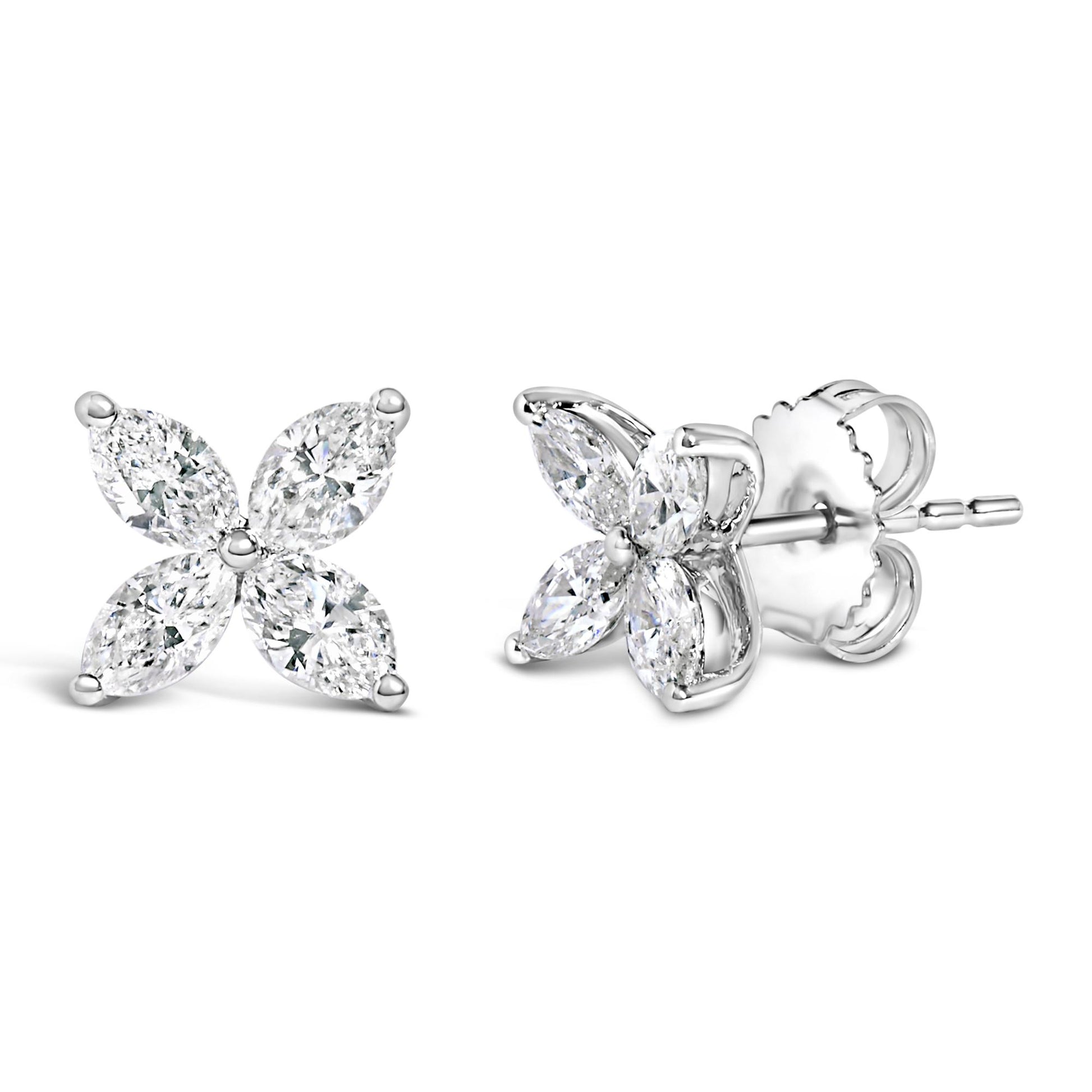 Pair of white metal earrings with four marquise-shaped white gemstones arranged in a floral pattern, shown from front and side angles.