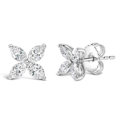 Pair of white metal earrings with four marquise-shaped white gemstones arranged in a floral pattern, shown from front and side angles.