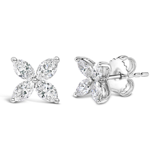 Pair of white metal earrings with four marquise-shaped white gemstones arranged in a floral pattern, shown from front and side angles.