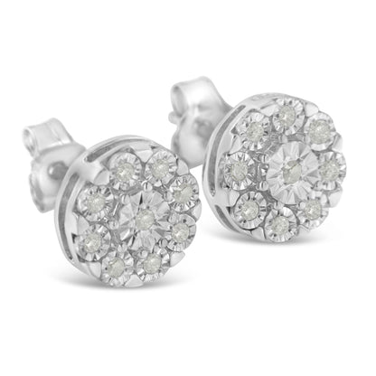 Close-up front angled view of a pair of white metal round stud earrings with multiple small white gemstones set in a cluster pattern.
