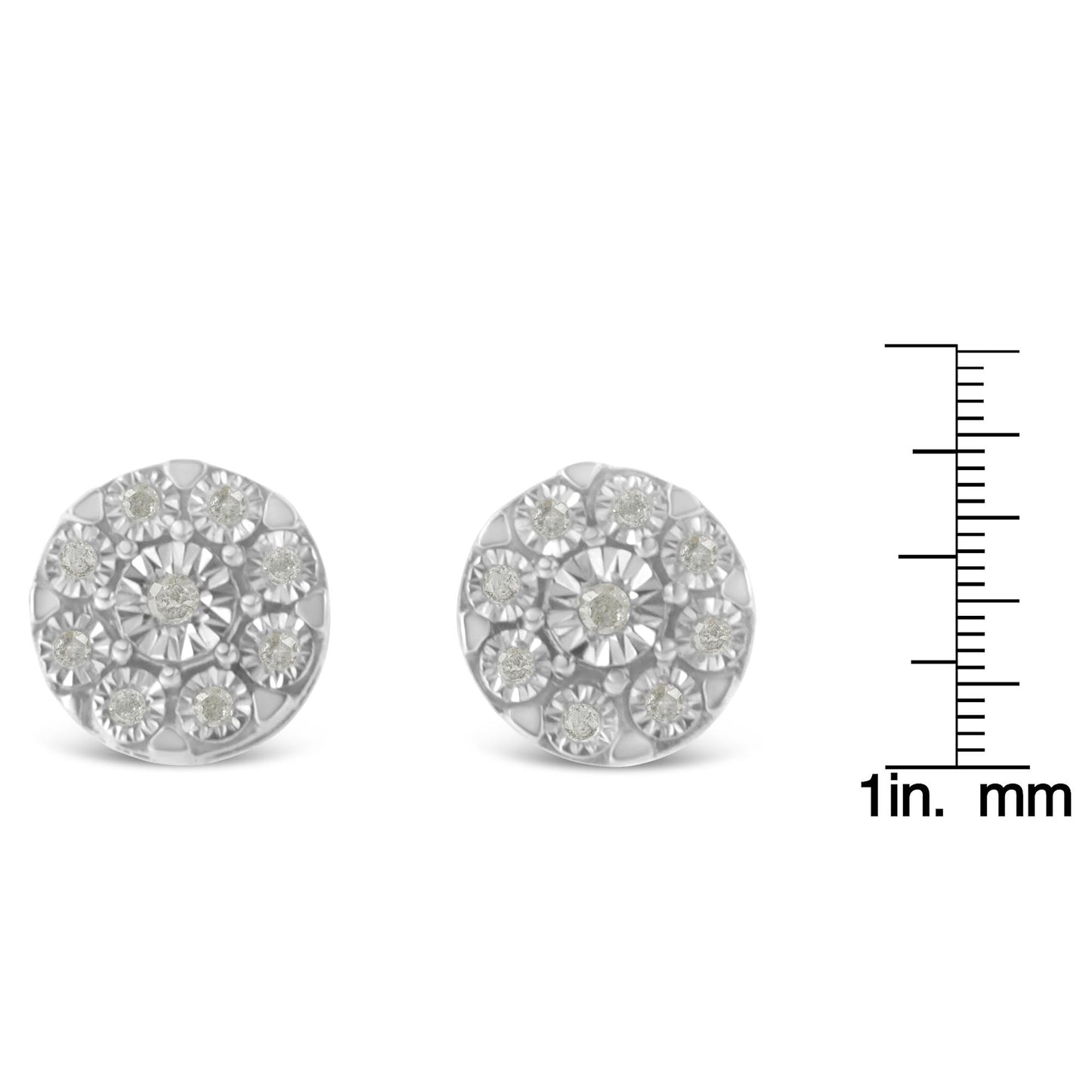 Front view of a pair of round white metal stud earrings with white gemstones, displayed next to a ruler for size reference.