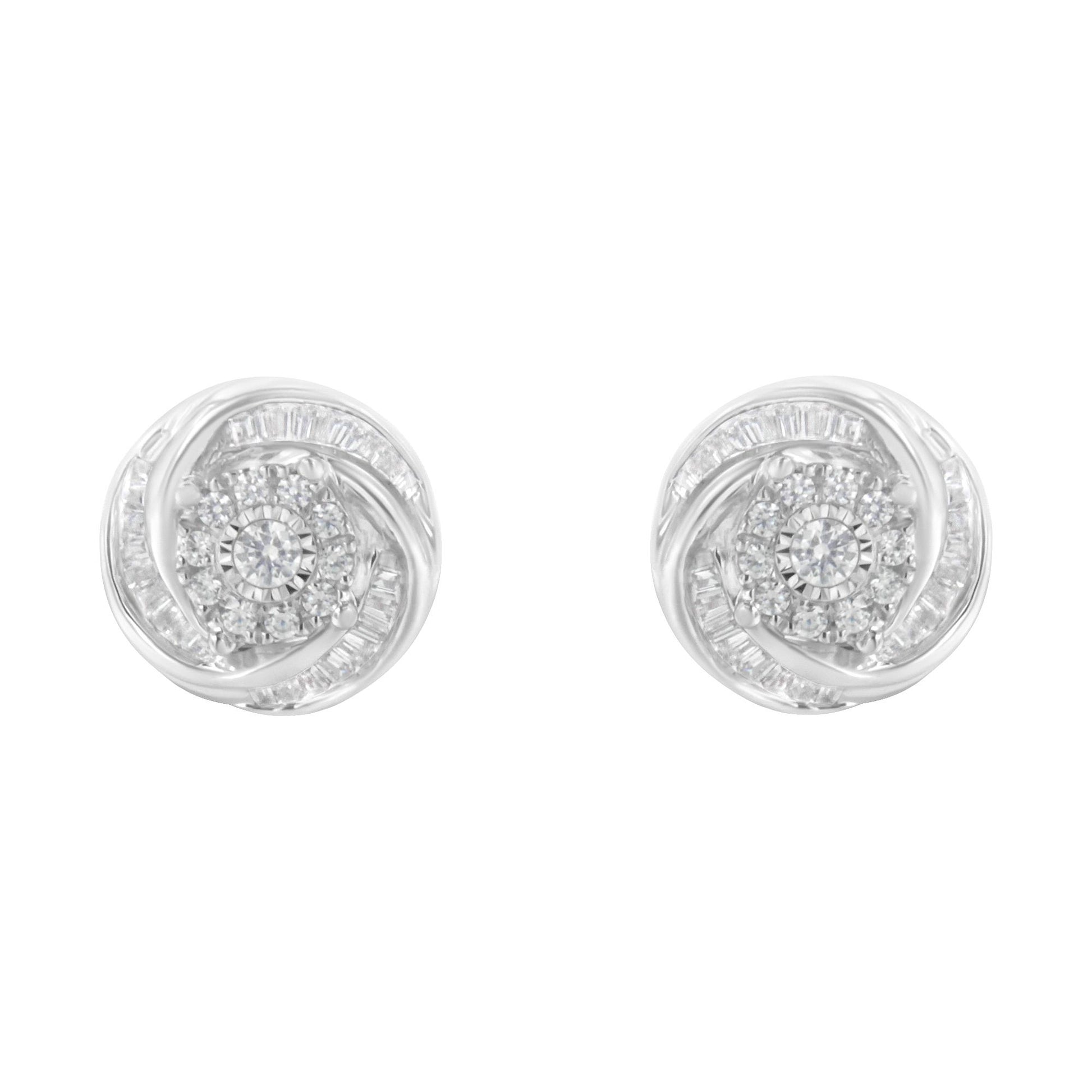 Pair of white metal round stud earrings with a central round gemstone cluster surrounded by baguette-shaped gemstones in a swirling design, shown from the front.