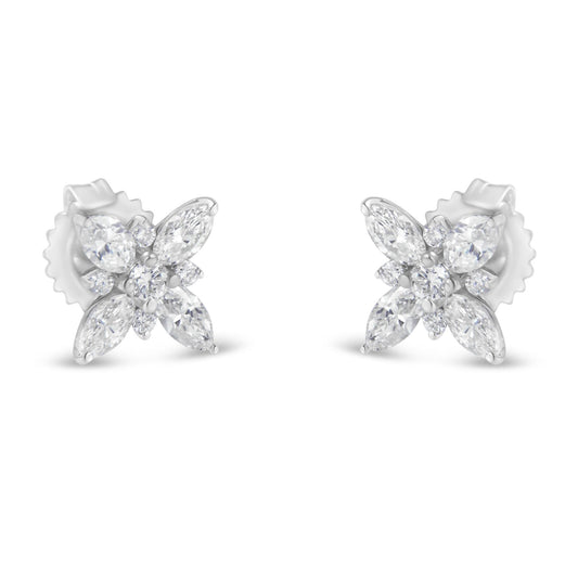 Front-facing shot of white metal stud earrings with a floral design featuring marquise and round white gemstones in prong settings.