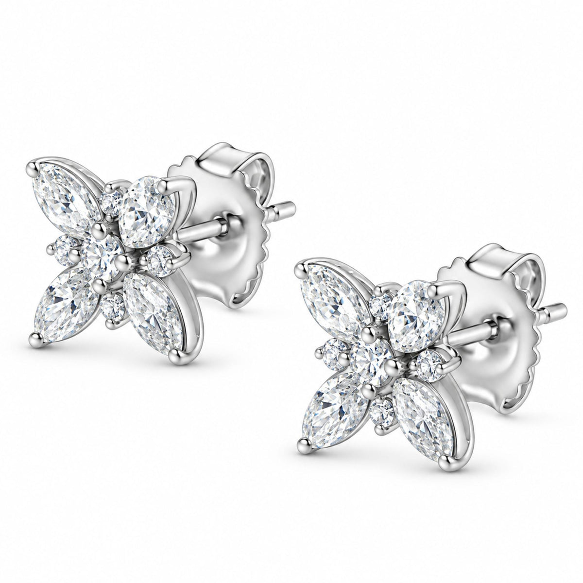 Angled view of 14K white gold flower stud earrings showcasing eight marquise and two round diamonds with push backs