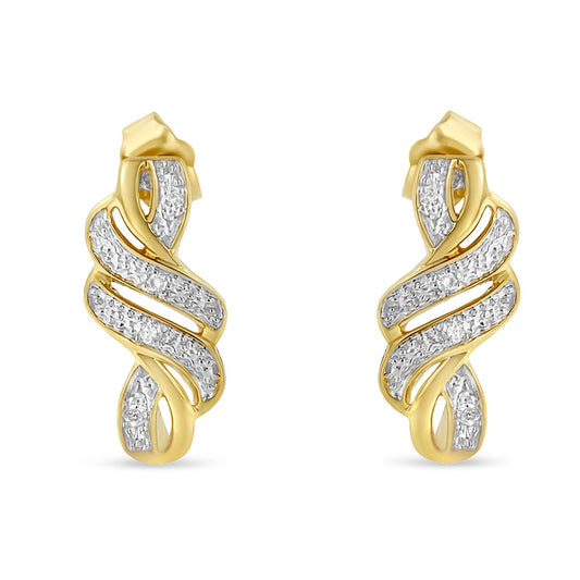 Front view of a pair of earrings with a twisted ribbon design featuring yellow and white metal sections adorned with pavé-set round white gemstones.