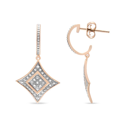 Front and side view of rose metal earrings with diamond-shaped dangles set with white round pave gemstones.