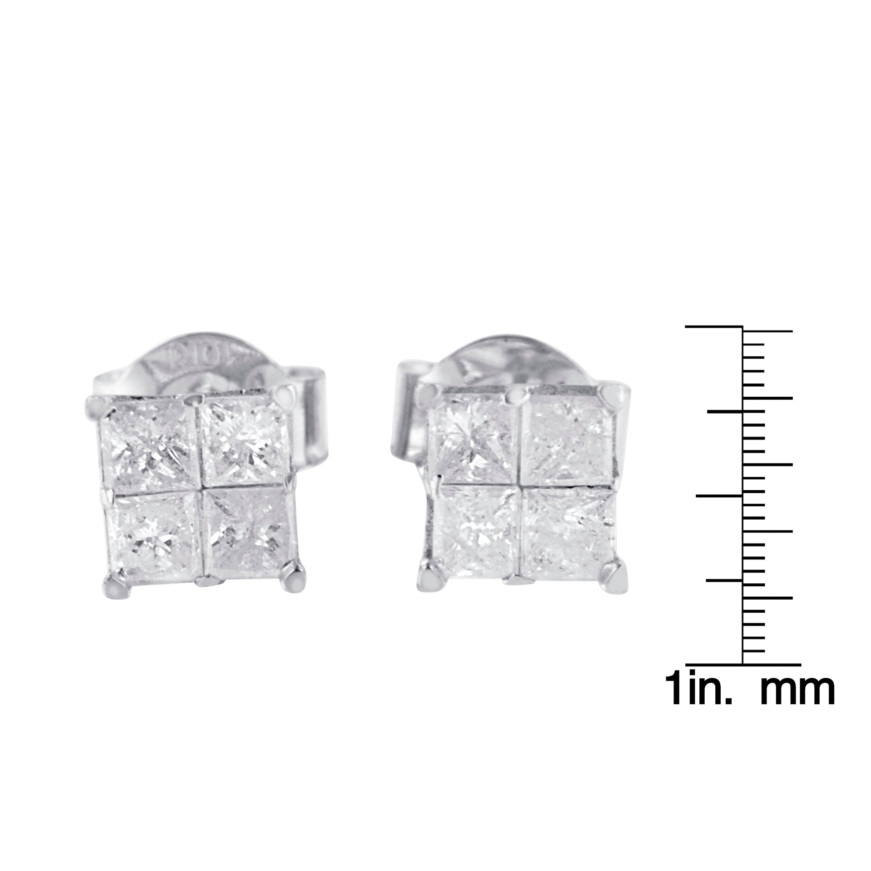 Front view of white metal stud earrings with four princess-shaped white gemstones in an invisible setting, shown next to a ruler for size reference.