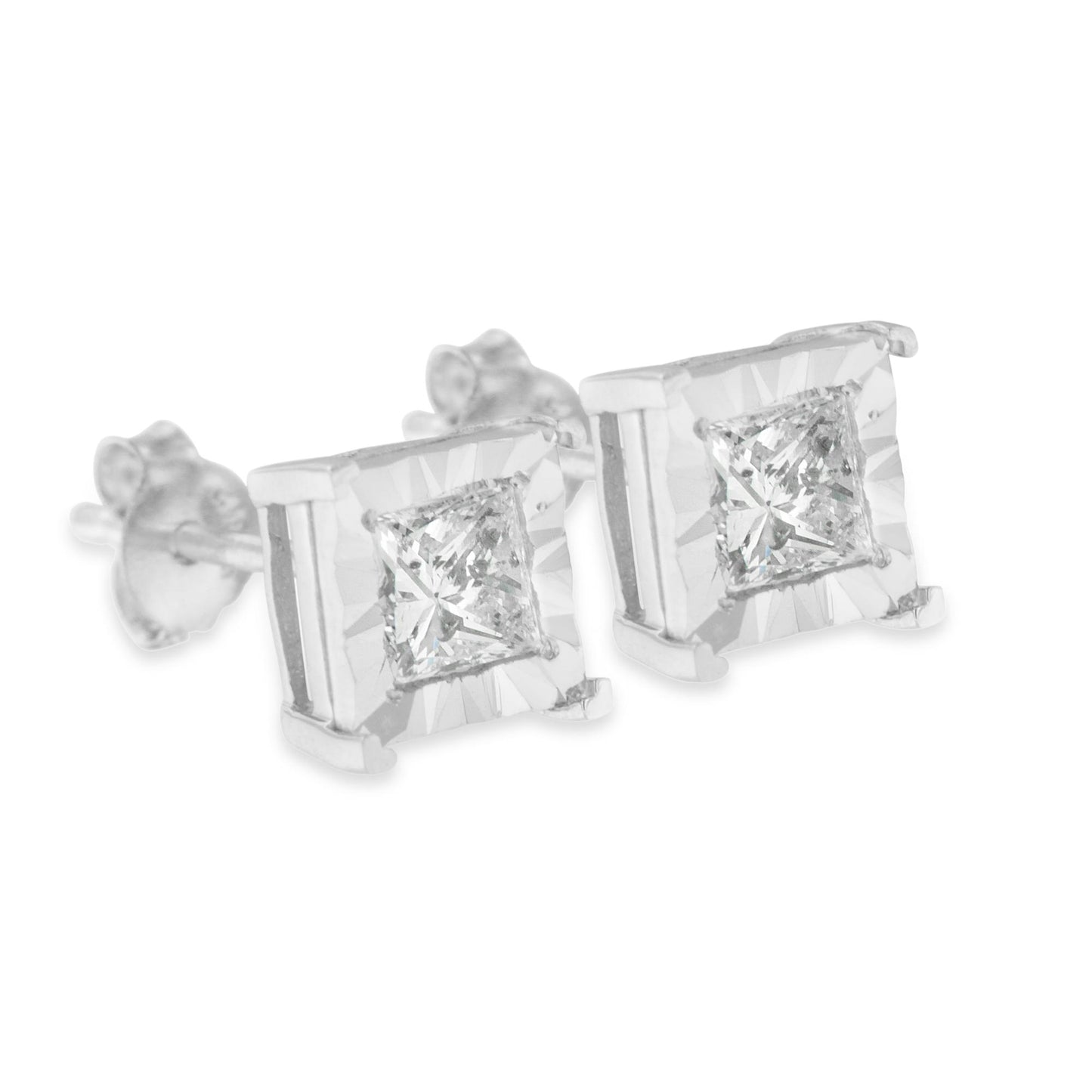 Close-up front angle of white metal stud earrings with square-shaped white gemstones in a miracle setting.