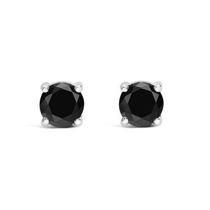 Front view of white metal stud earrings featuring round black gemstones in four-prong settings.