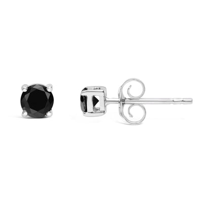 Close-up front and side view of white metal stud earrings with round black gemstones in four-prong settings.