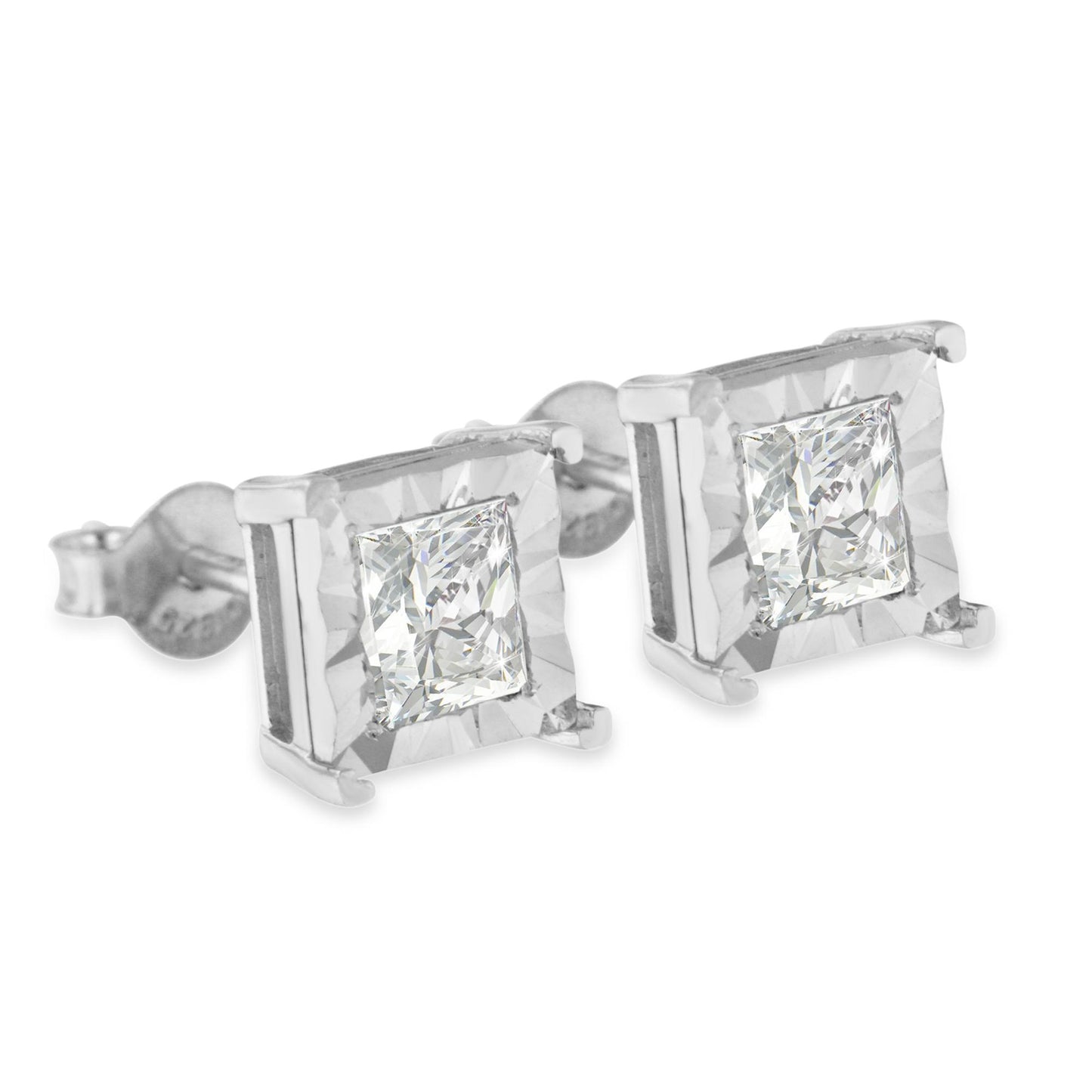 Close-up angled view of white metal stud earrings featuring princess-shaped white gemstones in miracle settings.