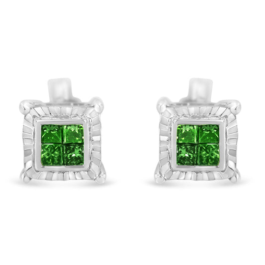 Front-facing shot of white metal square earrings with clusters of green princess-shaped gemstones in invisible settings.