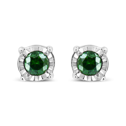 Front view of white metal stud earrings with round green gemstones in miracle setting.