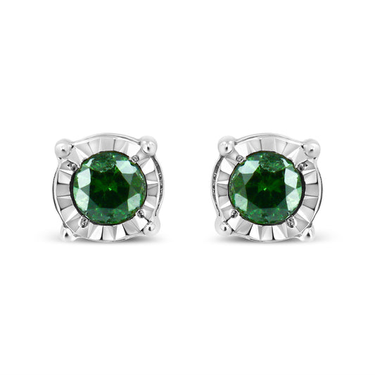 Front view of white metal stud earrings with round green gemstones in miracle setting.