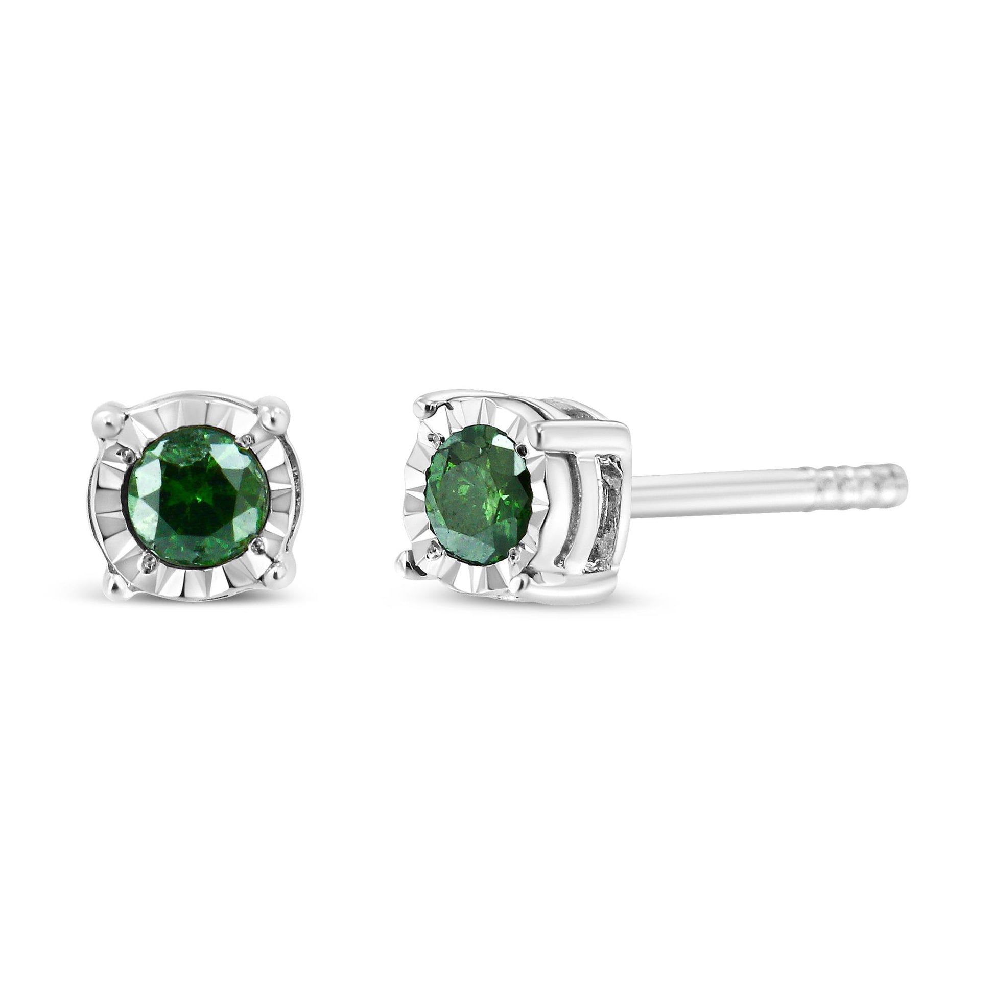 Close-up front and side view of white metal stud earrings with round green gemstones in miracle setting.