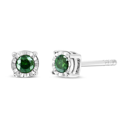 Close-up front and side view of white metal stud earrings with round green gemstones in miracle setting.