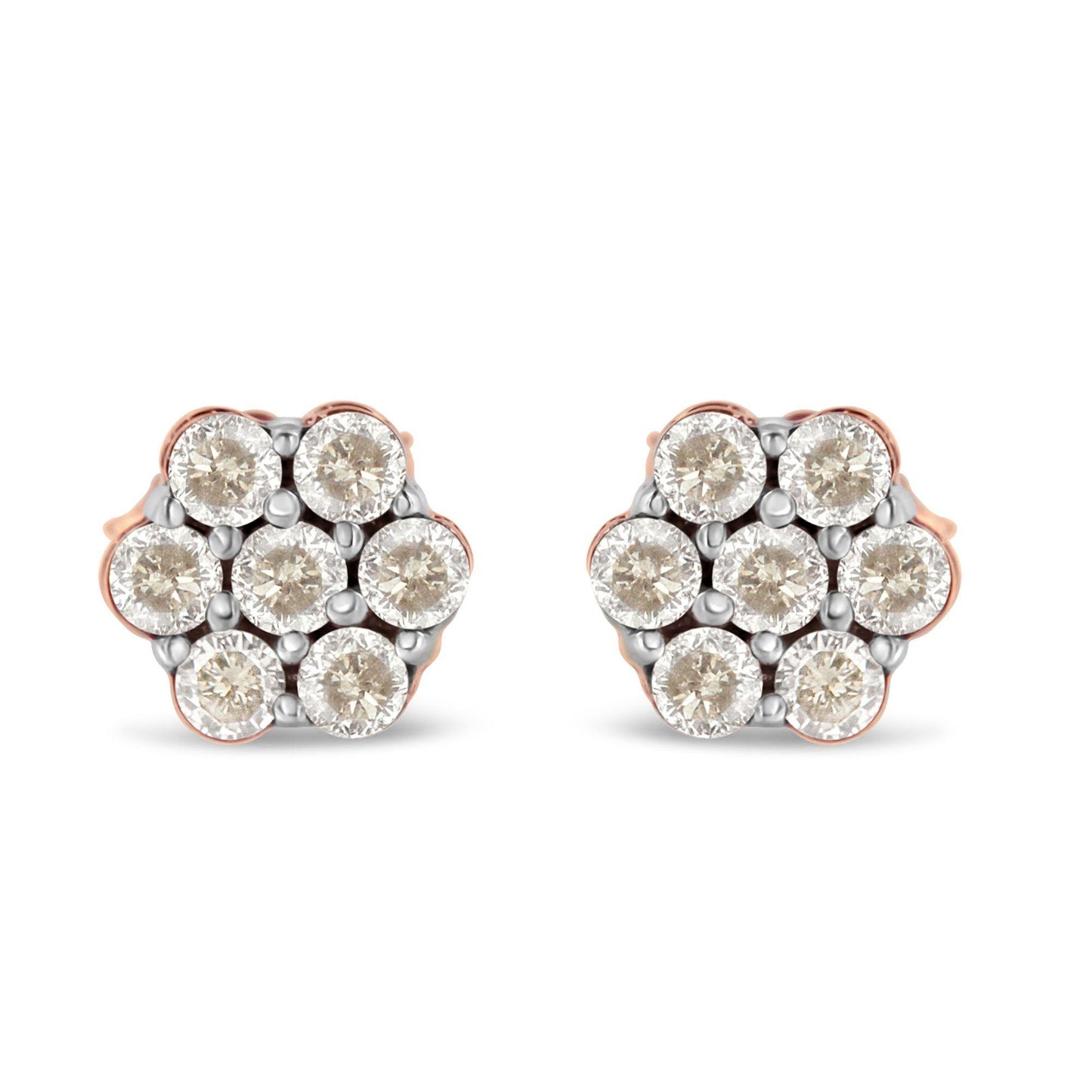 Front view of a pair of rose metal stud earrings with round white gemstones in a cluster design.