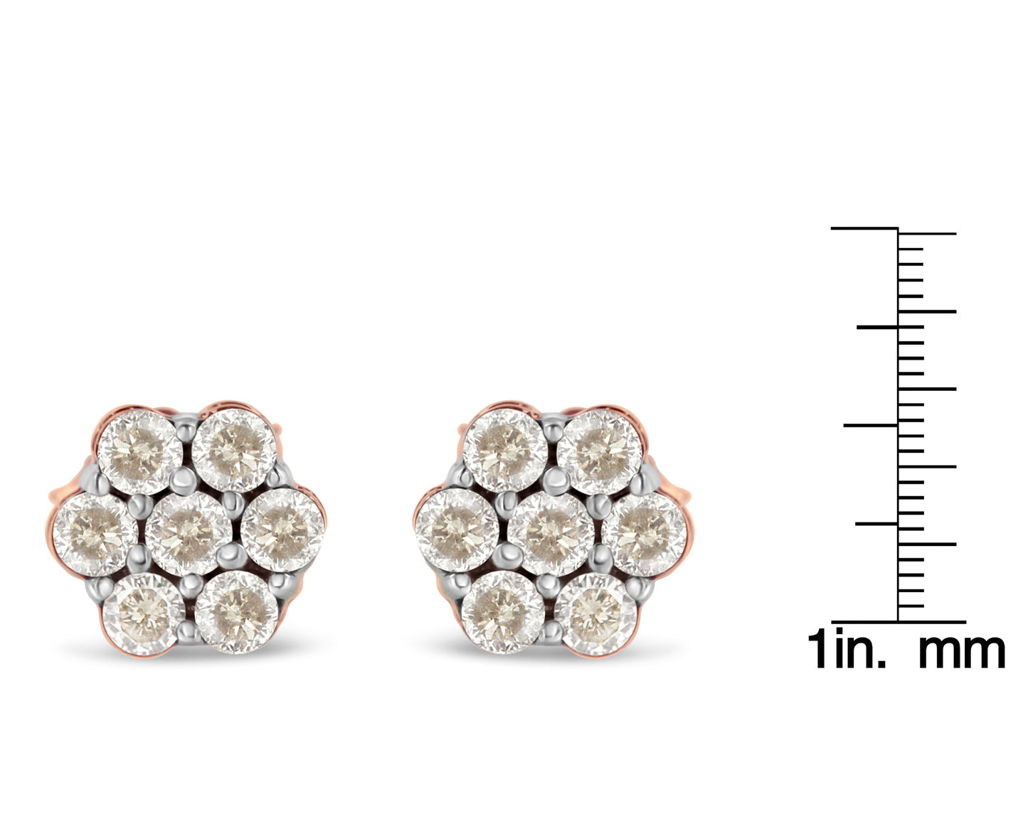 Front view of rose-colored metal stud earrings with clustered round white gemstones, shown next to a ruler for size reference.