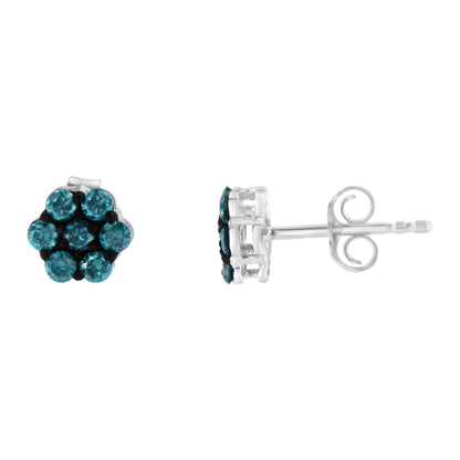 Pair of white metal stud earrings with round blue gemstones in prong settings, shown from front and side angles.
