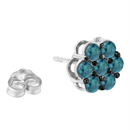 Close-up side angle of a white metal stud earring featuring a cluster of round blue gemstones in prong settings with the earring back placed nearby.