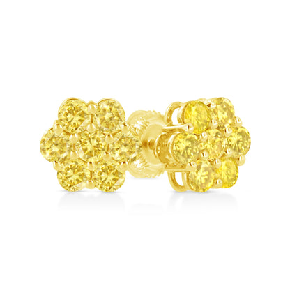 Close-up front and side view of yellow metal earrings shaped like a flower cluster with round yellow gemstones in prong settings.