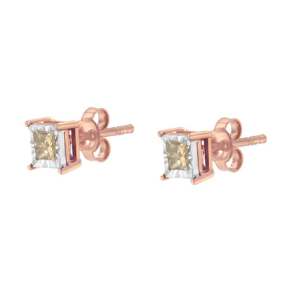 Pair of stud earrings with rose and white metal, each featuring a princess-shaped brownish gemstone in a miracle setting, shown from a front angled side view.