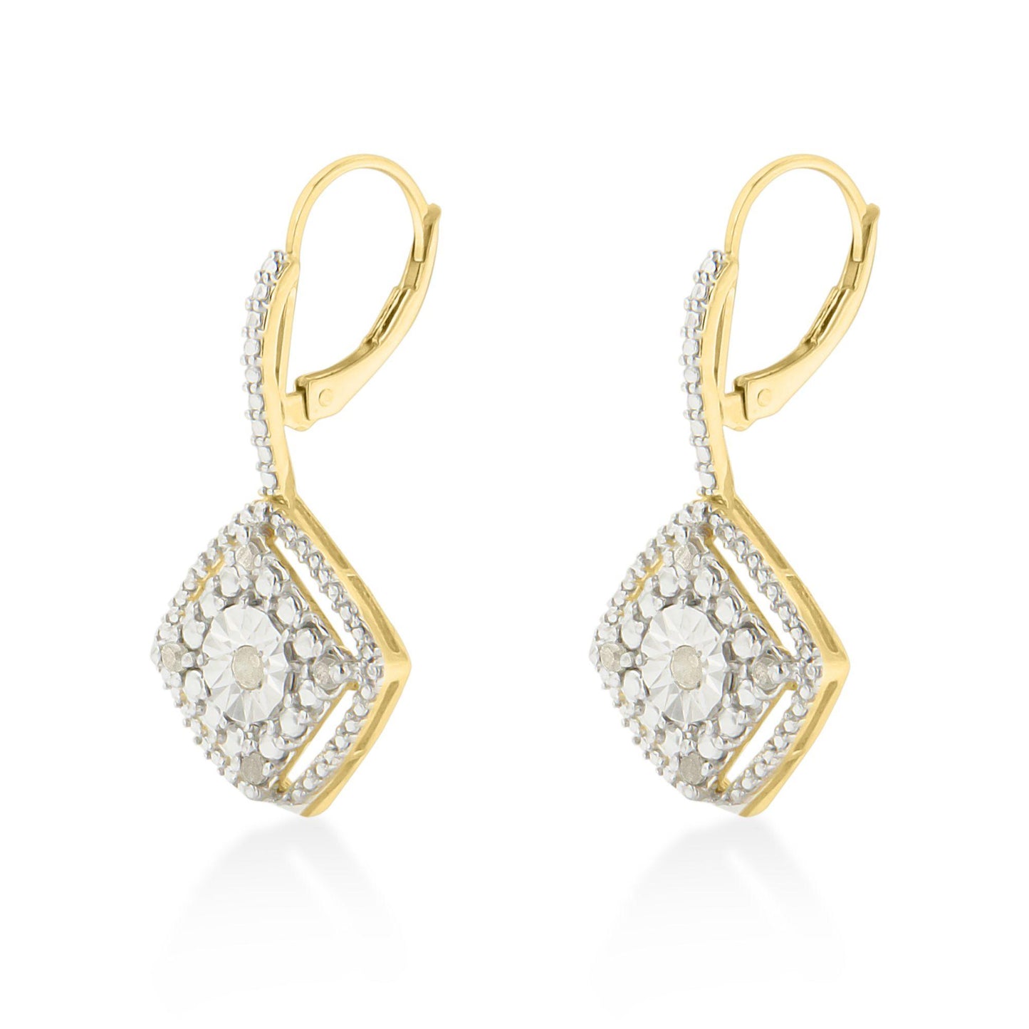 Pair of yellow metal earrings with a geometric shape decorated with round white gemstones in prong settings, shown from the front angle.