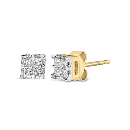 Pair of yellow metal stud earrings with square clusters of white princess-cut gemstones in invisible setting, shown in close-up angled view.