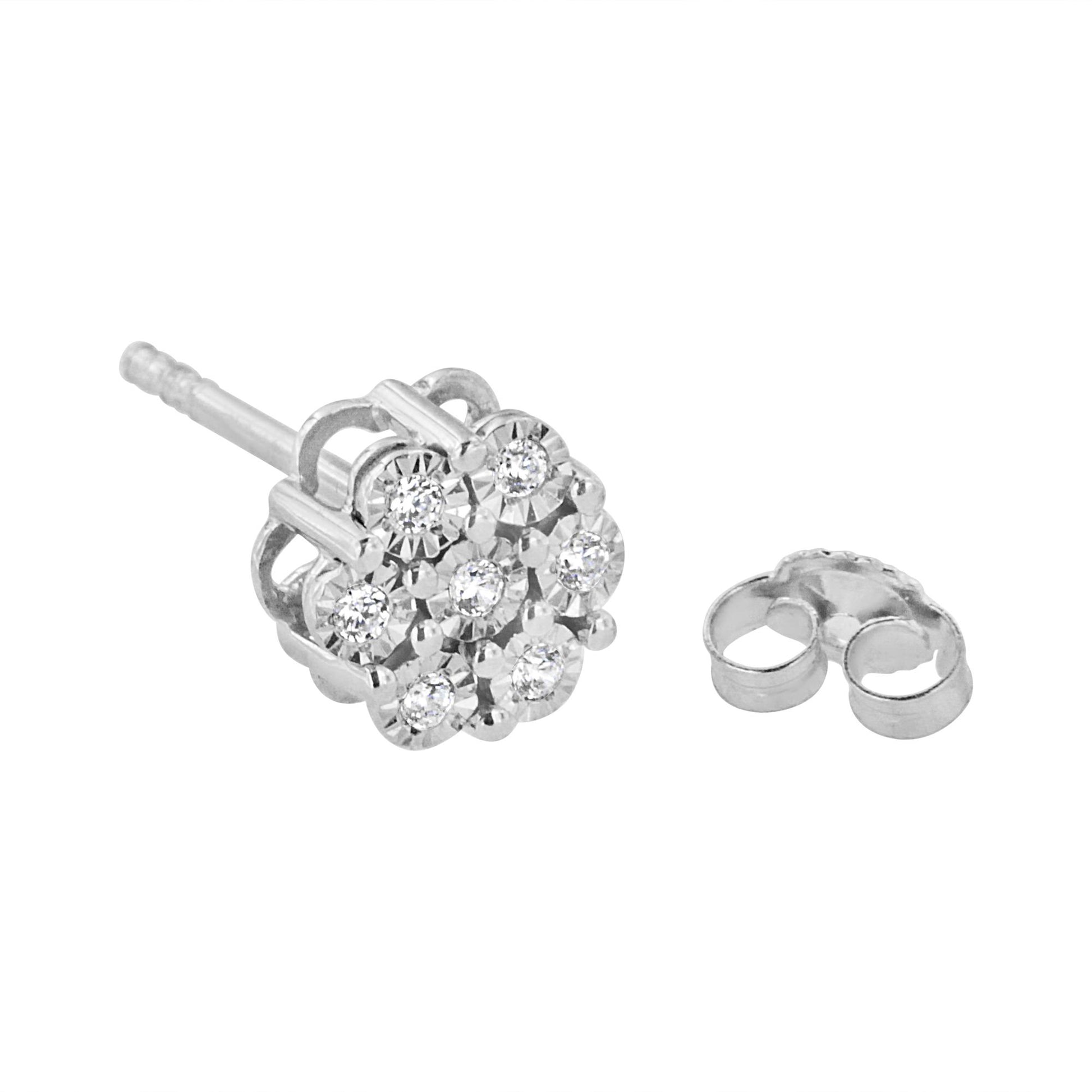 Close-up front angled view of a white metal stud earring with multiple round white gemstones in a cluster setting, with its backing shown separately.