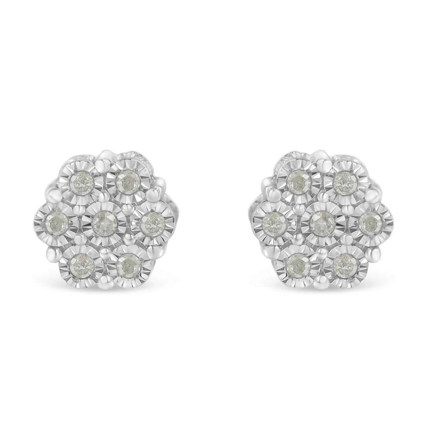 Front angle view of white metal circular earrings with cluster of round white gemstones in miracle setting.