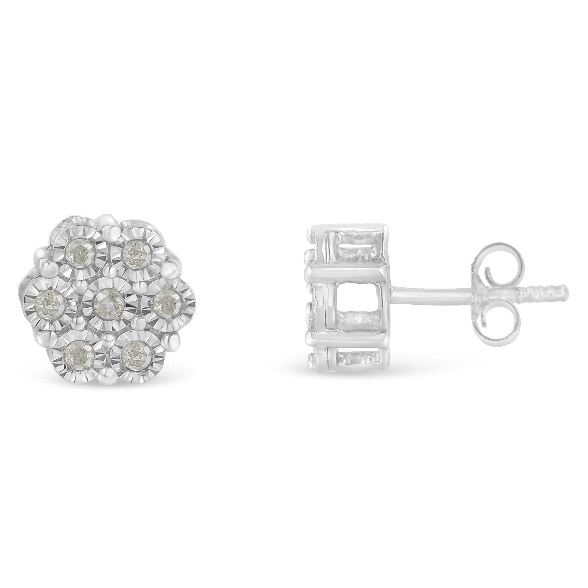 Front and side views of a pair of white metal stud earrings with a cluster of round white gemstones arranged in a floral pattern, shown against a white background.