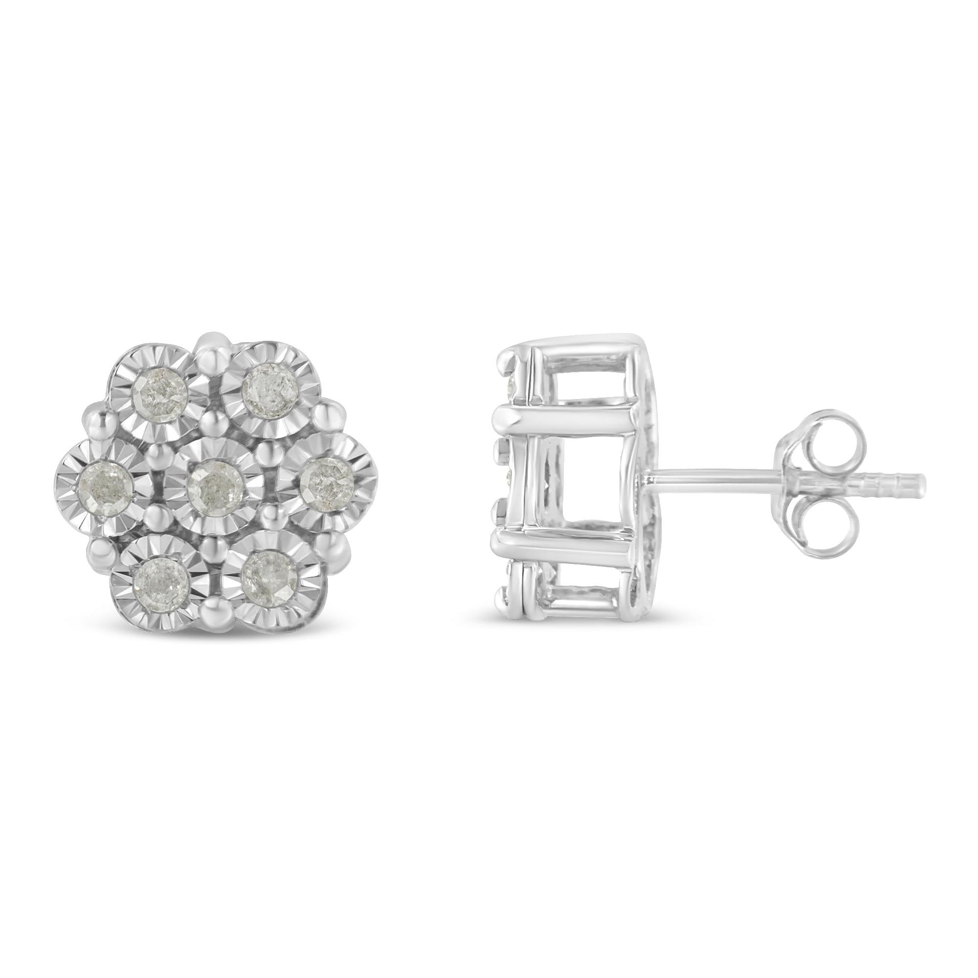Pair of white metal stud earrings with round white gemstones in a floral cluster design, shown from front and side angles.