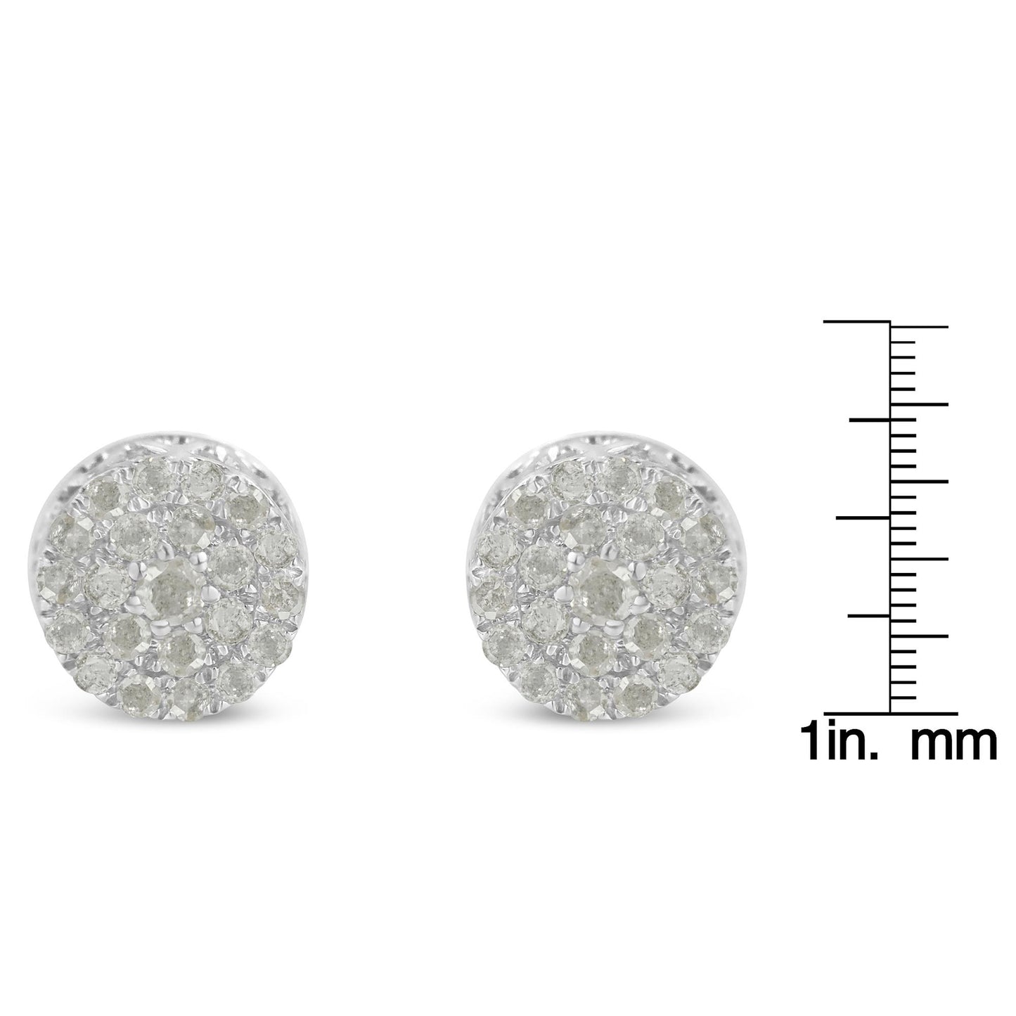 Front angle view of a pair of white metal round pave set white gemstone stud earrings next to a ruler for size reference.