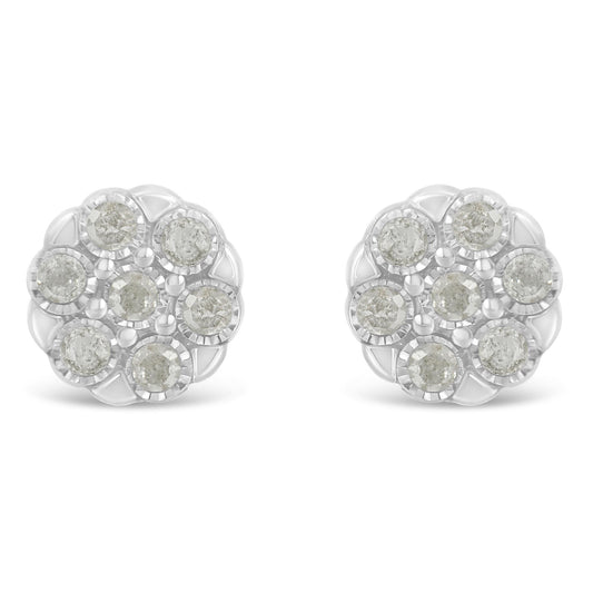 Front angle close-up of white metal round earrings featuring multiple white gemstones set in a circular cluster pattern.