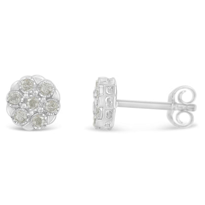 Close-up front and side view of a pair of white metal round-shaped stud earrings with multiple white gemstones in a clustered miracle setting.