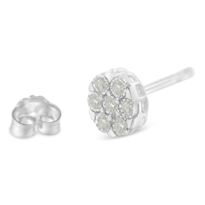 Close-up front angled view of a white metal stud earring set with round white gemstones in a cluster arrangement, accompanied by a separate earring back.