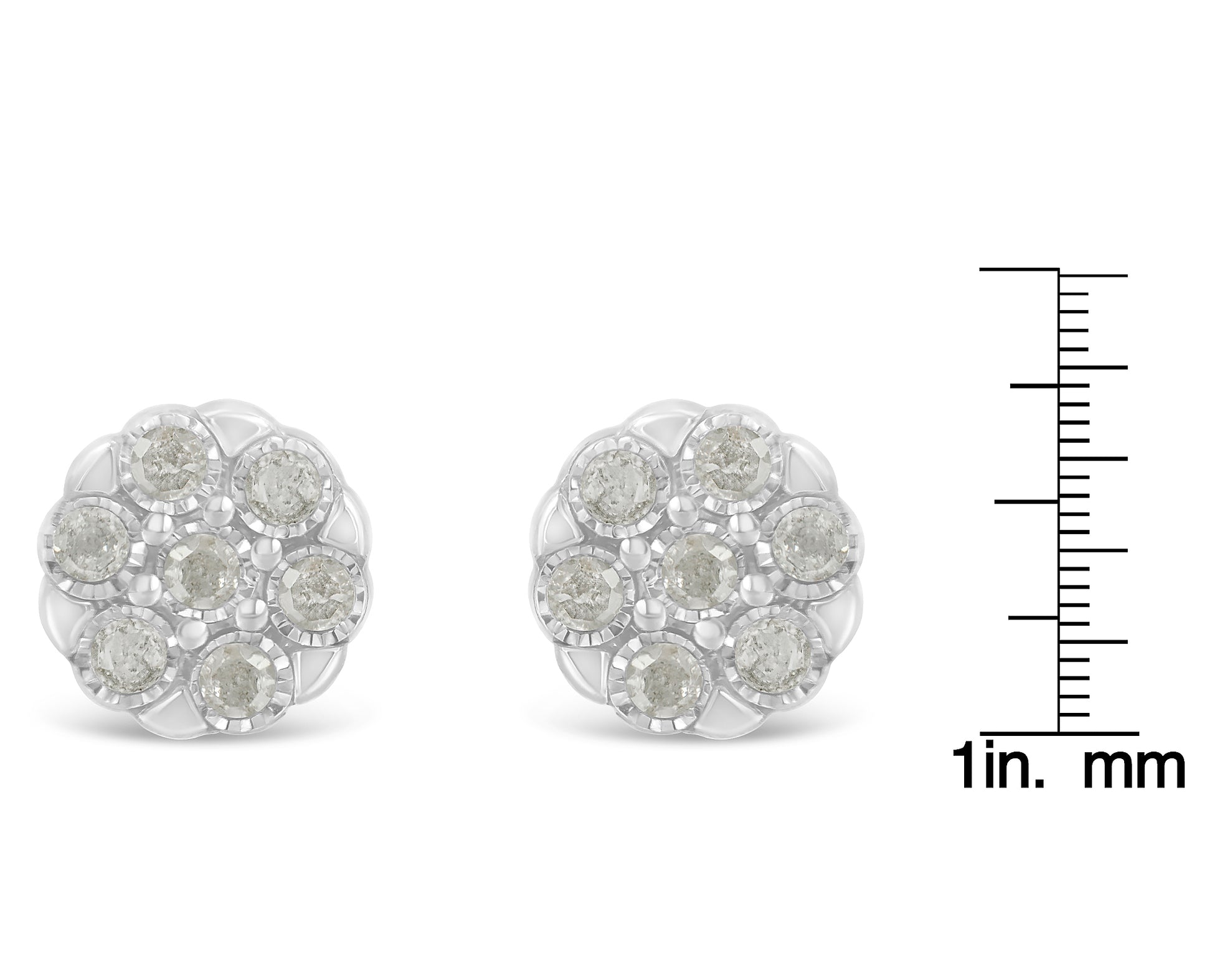 Front-facing close-up of white metal round cluster earrings with multiple white gemstones in a miracle setting, shown beside a size scale.