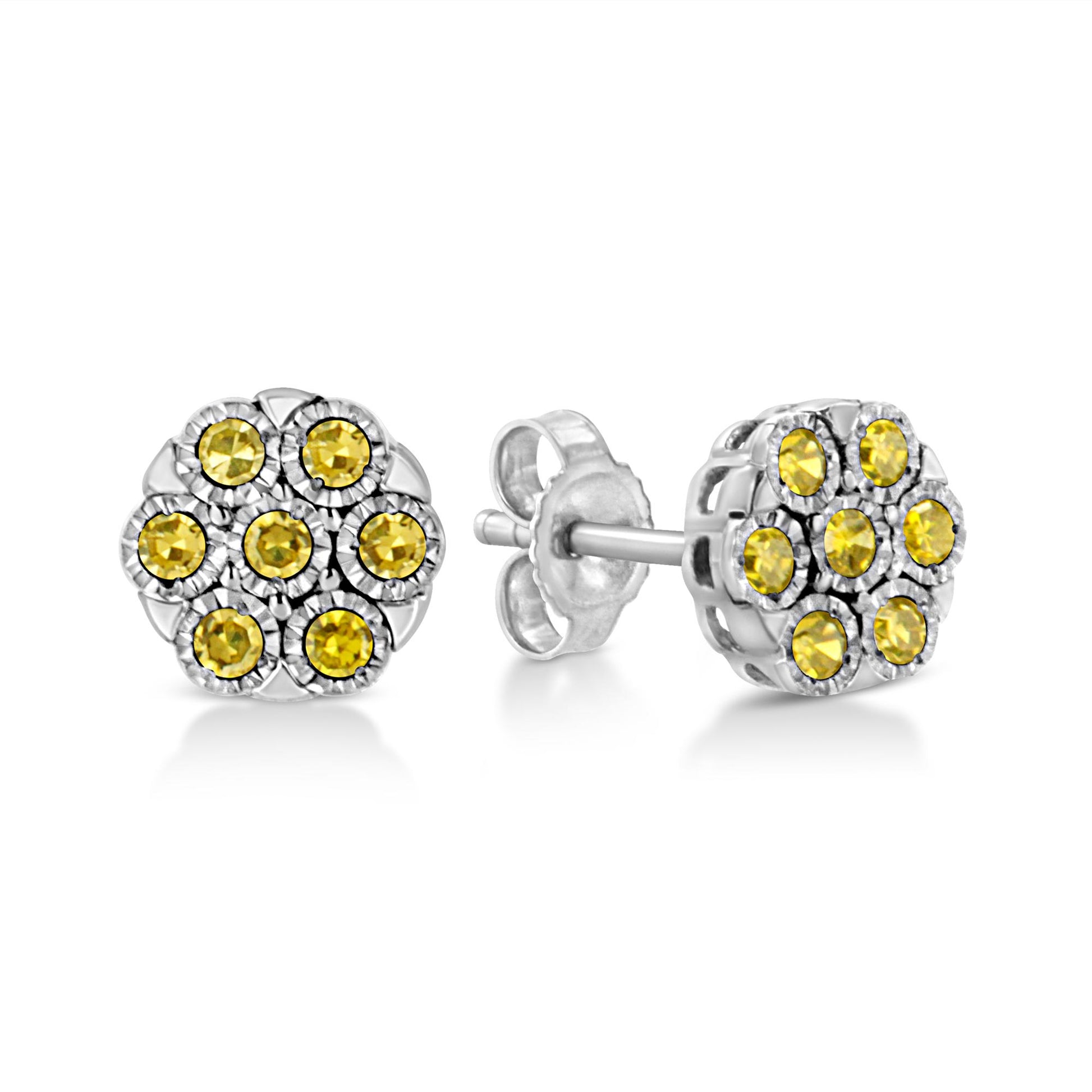 Pair of white metal stud earrings with round yellow gemstones in a floral cluster design, shown from front and side angles.