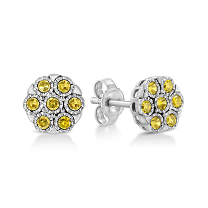 Pair of white metal stud earrings with round yellow gemstones in a floral cluster design, shown from front and side angles.