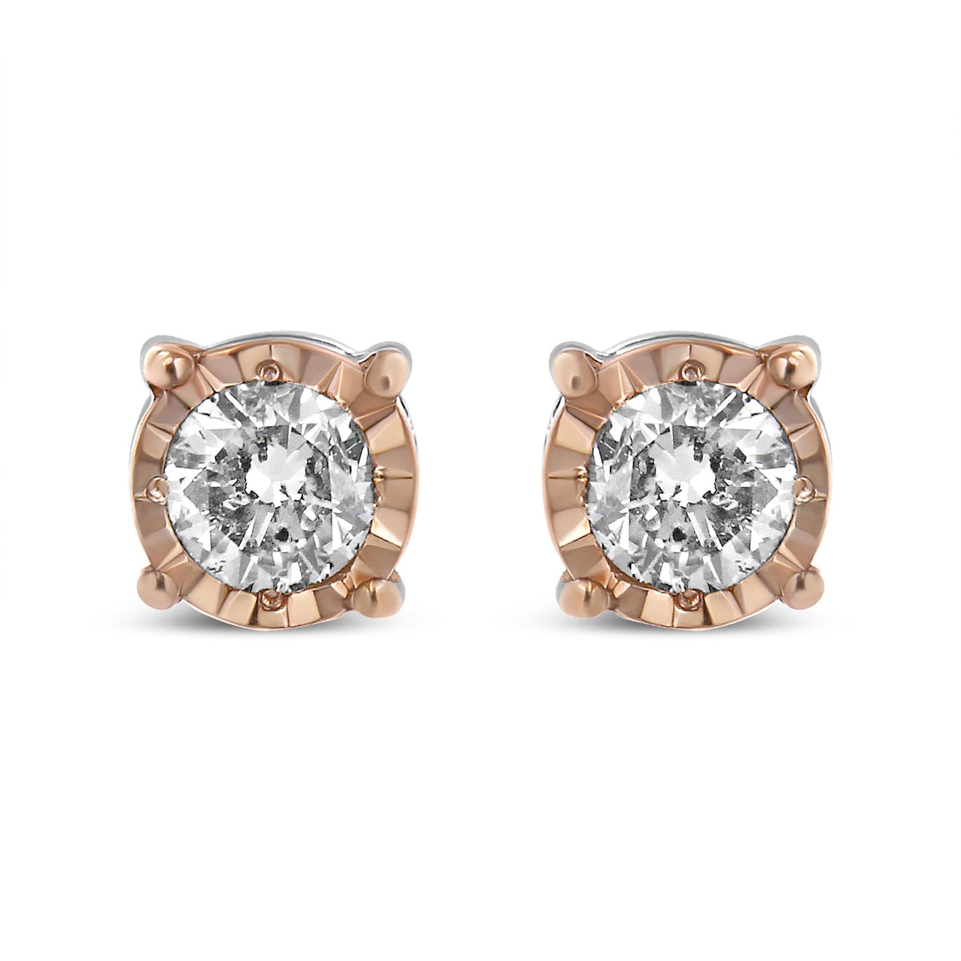 Front view of two-toned stud earrings with round white gemstones in miracle setting.
