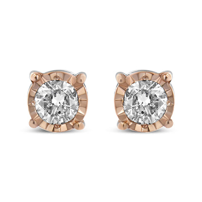 Front view of two-toned stud earrings with round white gemstones in miracle setting.
