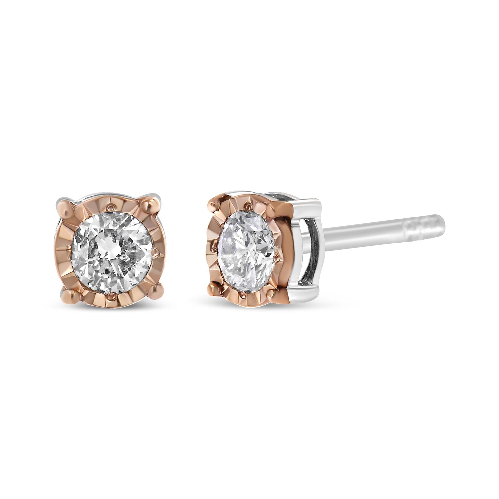 Close-up front and side view of two-toned stud earrings with round white gemstones in a miracle setting.