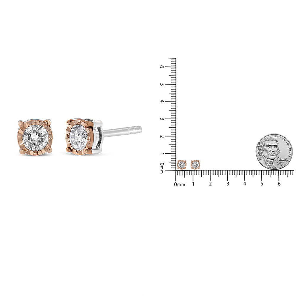 Two-toned stud earrings with round white gemstones in miracle setting, shown from front and side angles, next to scale with a coin for size reference.