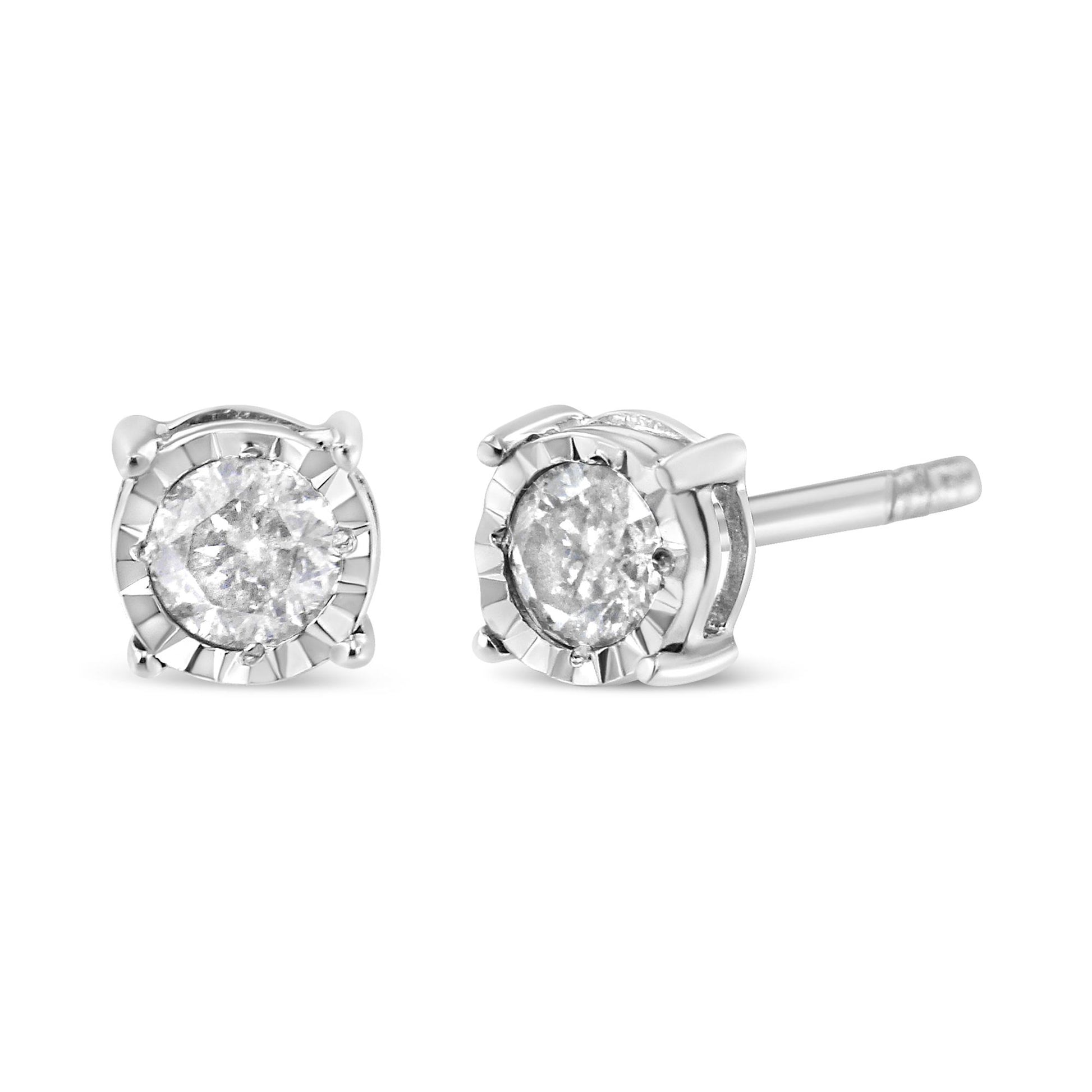 Close-up front and side view of white metal stud earrings with round, brownish-colored gemstones in miracle settings.