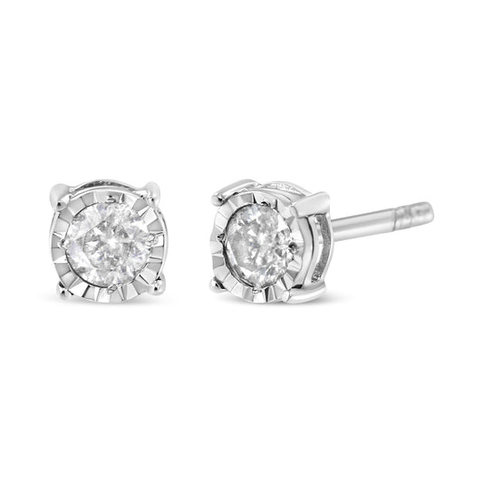 Close-up front and side view of white metal stud earrings with round, brownish-colored gemstones in miracle settings.
