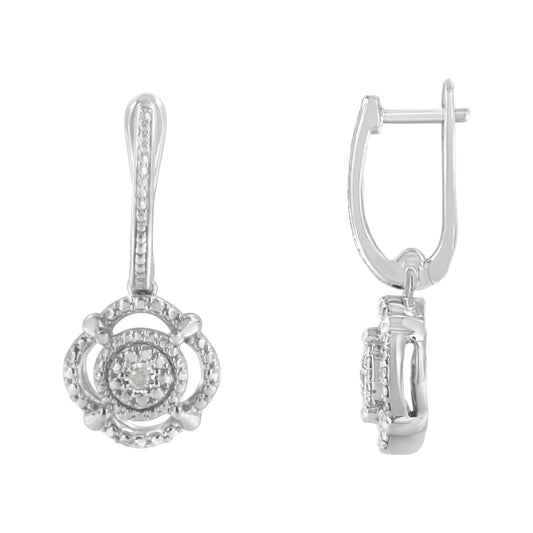 Front and side view of white metal earrings with round white gemstones in a miracle setting.