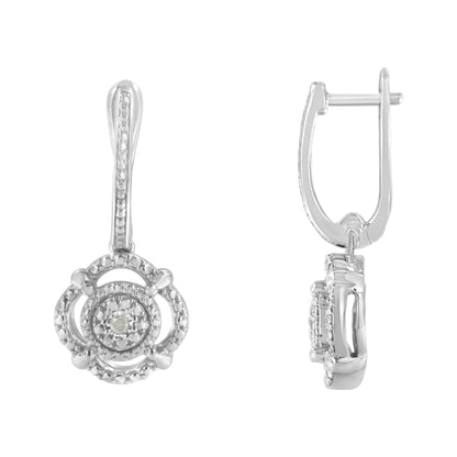 Front and side view of white metal earrings with round white gemstones in a miracle setting.