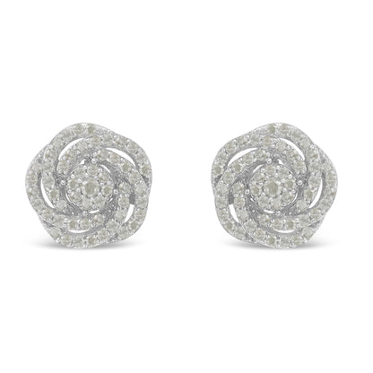 Front view of white metal earrings designed with spiraling rows of round white gemstones in prong settings.